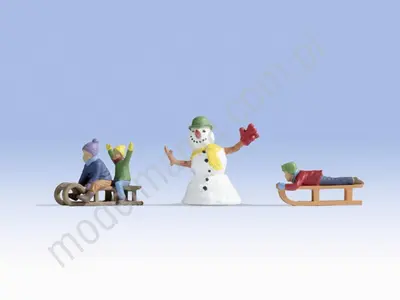 Dzieci bawiące się w śniegu