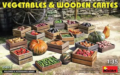 Drewniane skrzynie z warzywami i owocami