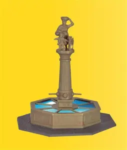 Fontanna z posągiem na szczycie kolumny, podświetlana
