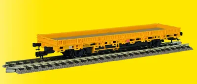 Wagon towarowy platforma niskoburtowa z napędem, żółta