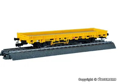 Wagon towarowy platforma niskoburtowa z napędem, żółta, wersja na 3 szyny